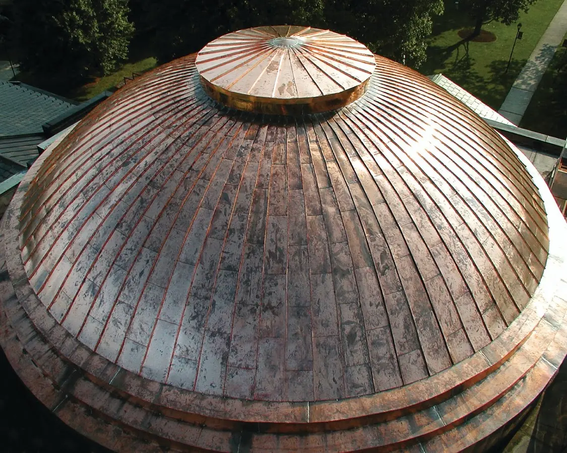 Craftsman Roofing crew installing a new roof in Vernon